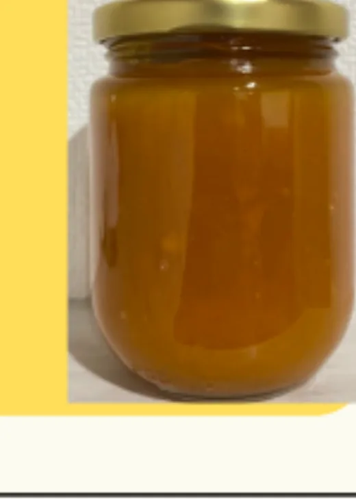 Home made mango jam in a glass jar